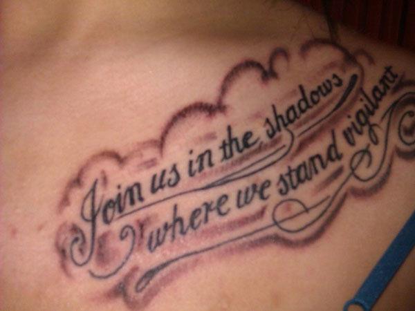Join Us In The Shadows Where We Stand Vigilant Quote Tattoo On Collarbone