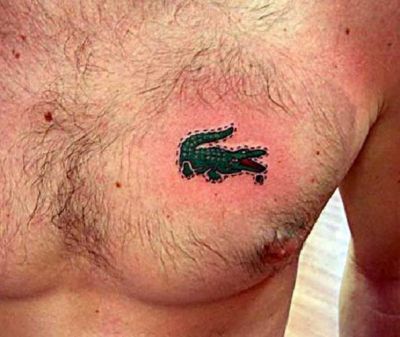 Little Alligator Tattoo On Man Chest
