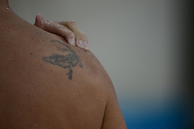 Little Alligator Tattoo On Right Back Shoulder