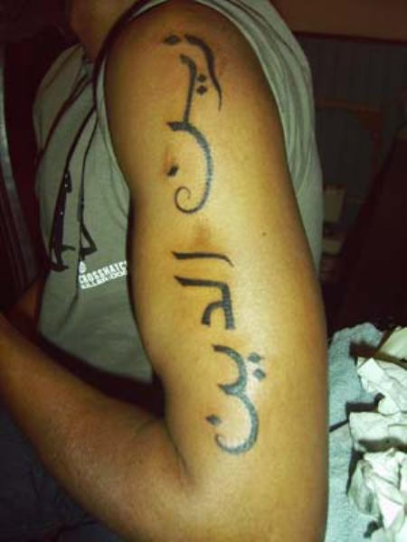 Man Left Half Sleeve Arabic Tattoo