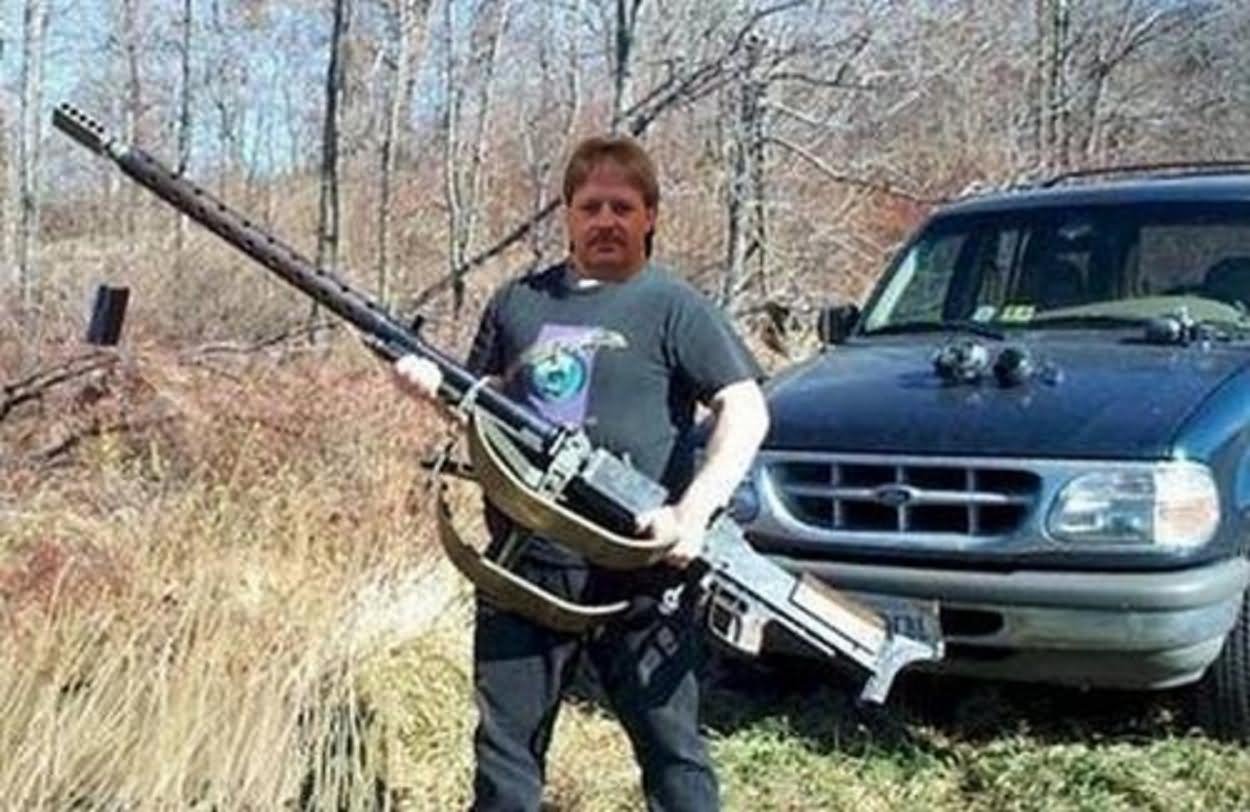 Man With Giant Gun Funny Redneck Image