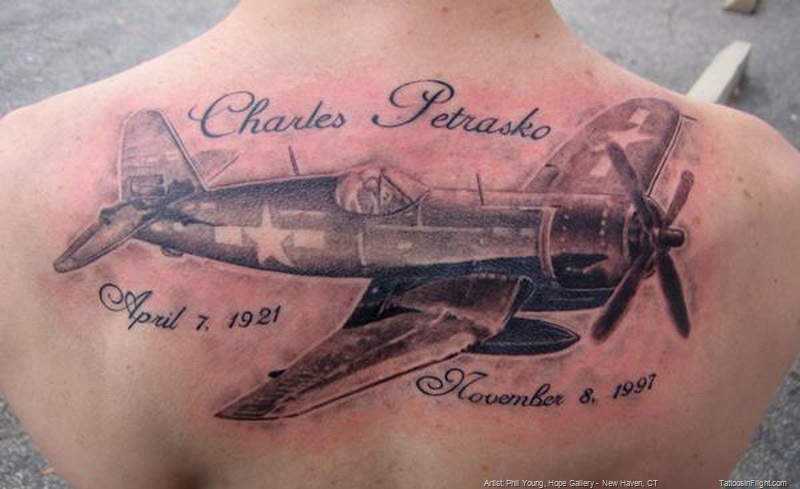Memorial Airplane Tattoo On Upper Back