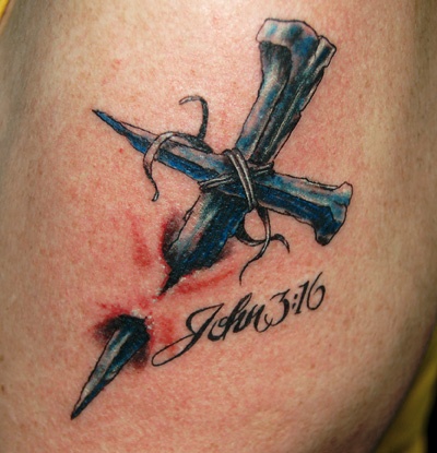 Memorial Ripped Skin Cross Tattoo Design