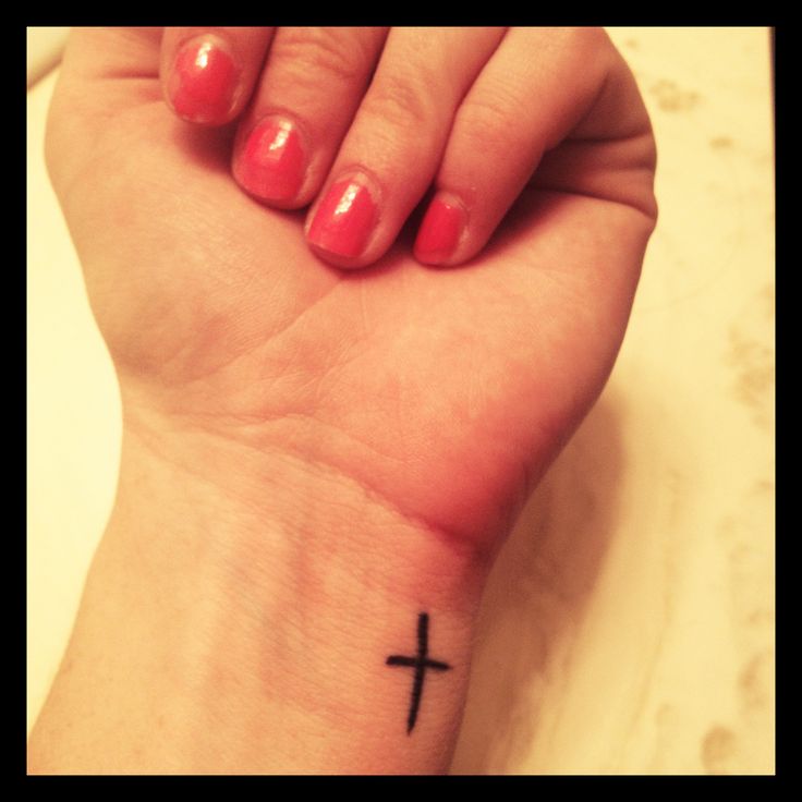 Nice Black Ink Cross Wrist Tattoo