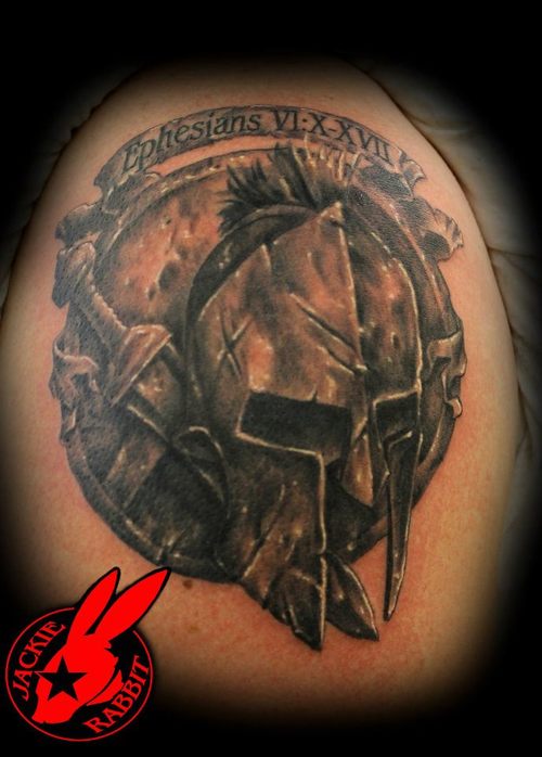 Numeric Banners And Spartan Helmet Tattoo On Shoulder