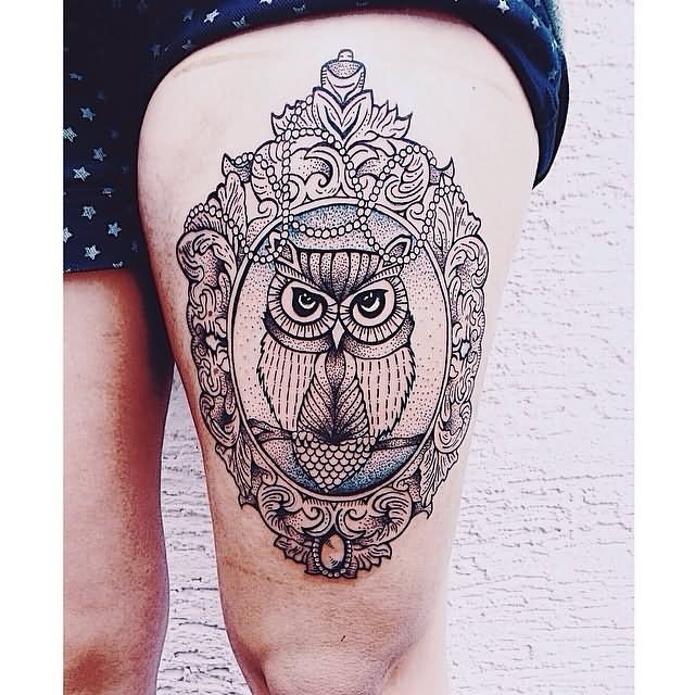 Owl In Frame Tattoo On Girl Thigh
