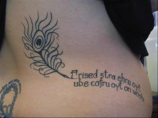 Peacock Feather And Quote Tattoo On Side Rib