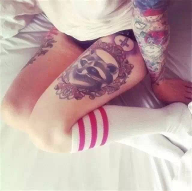Raccoon Face In Frame Tattoo On Girl Left Thigh