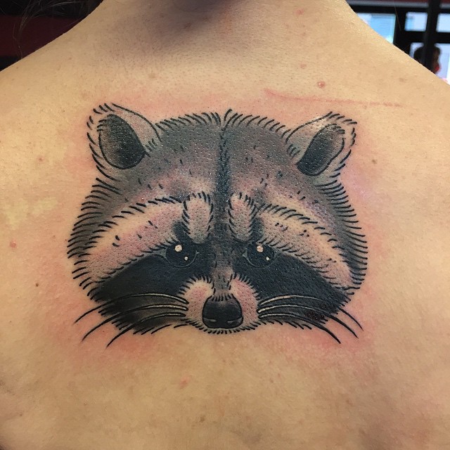 Raccoon Head Tattoo On Man Upper Back
