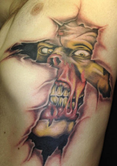 Ripped Skin 3D Zombie Face In Cross Tattoo Design For Side Rib