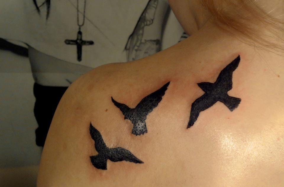 Silhouette Three Flying Birds Tattoo On Girl Left Back Shoulder