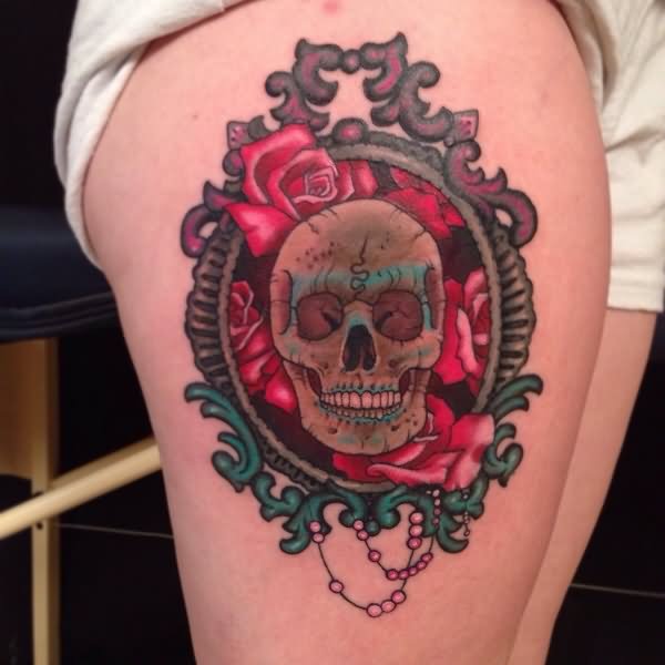 Skull With Roses In Frame Tattoo On Side Thigh