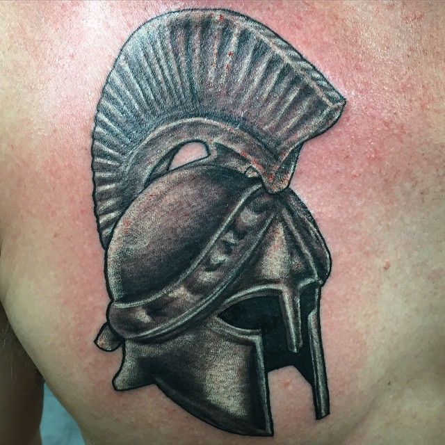 Spartan Helmet Tattoo On Chest For Men