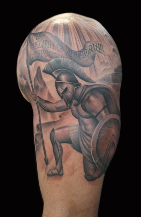 Spartan Tattoo On Man Left Half Sleeve