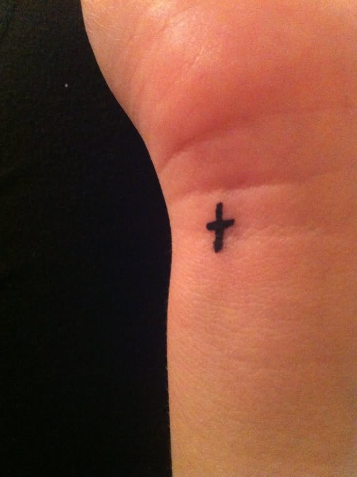 Tiny Black Cross Wrist Tattoo