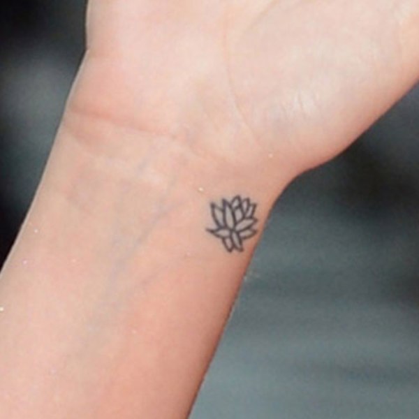 Tiny Lotus Flower Wrist Tattoo