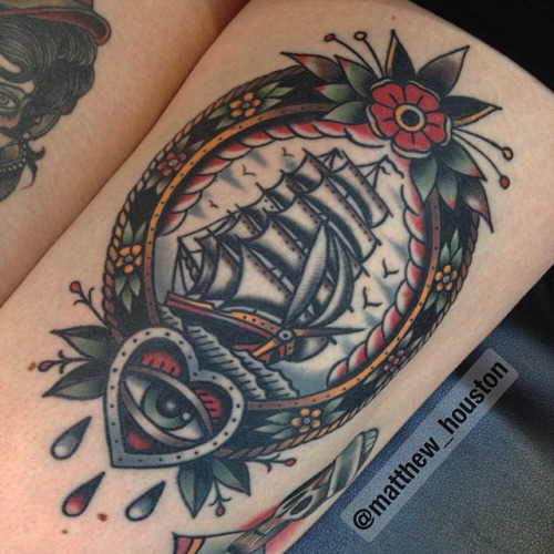 Traditional Ship In Frame Tattoo Design