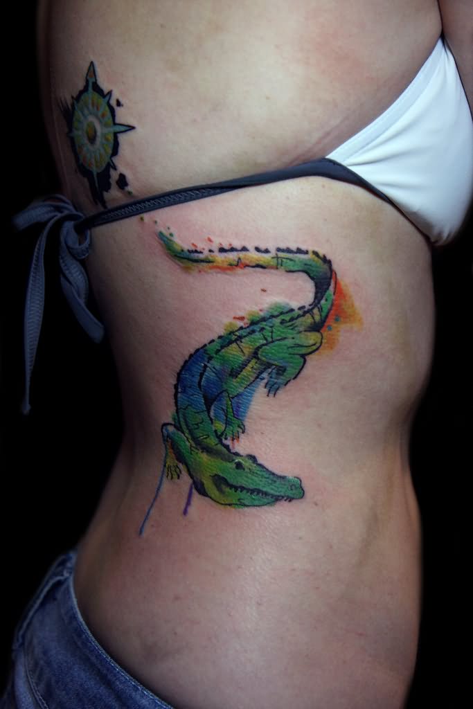 Watercolor Alligator Tattoo On Girl Side Rib