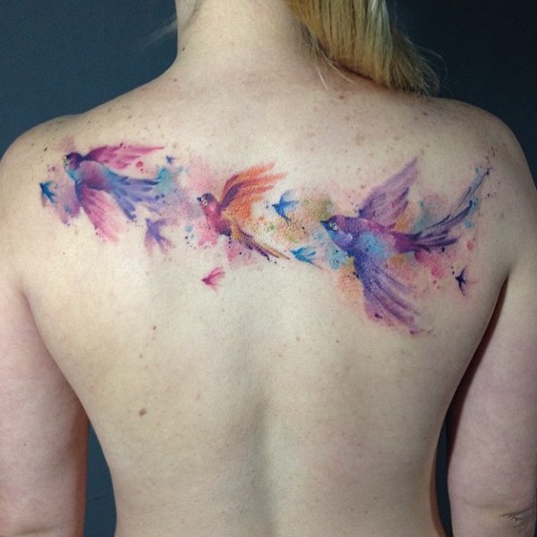 Watercolor Flying Birds Tattoo On Girl Upper Back