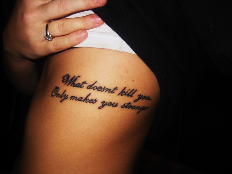 What Doesn't Kill You Only Makes You Stronger - Rib Side Quote Tattoo