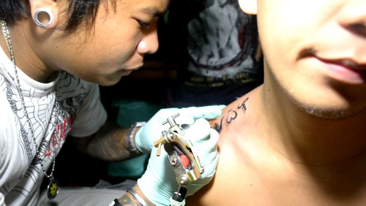 Alibata Tattoo On Guy Upper Shoulder