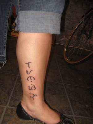 Alibata Tattoo On Left Leg For Women