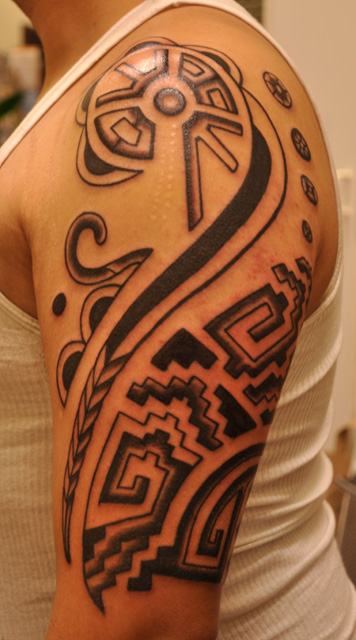 Alibata Tattoo On Man Left Half Sleeve