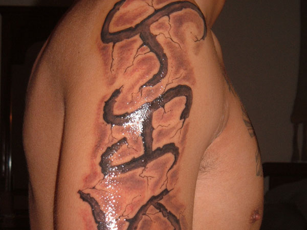 Alibata Tattoo On Man Right Half Sleeve
