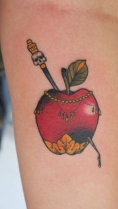 Awesome Dagger In Apple Tattoo Design