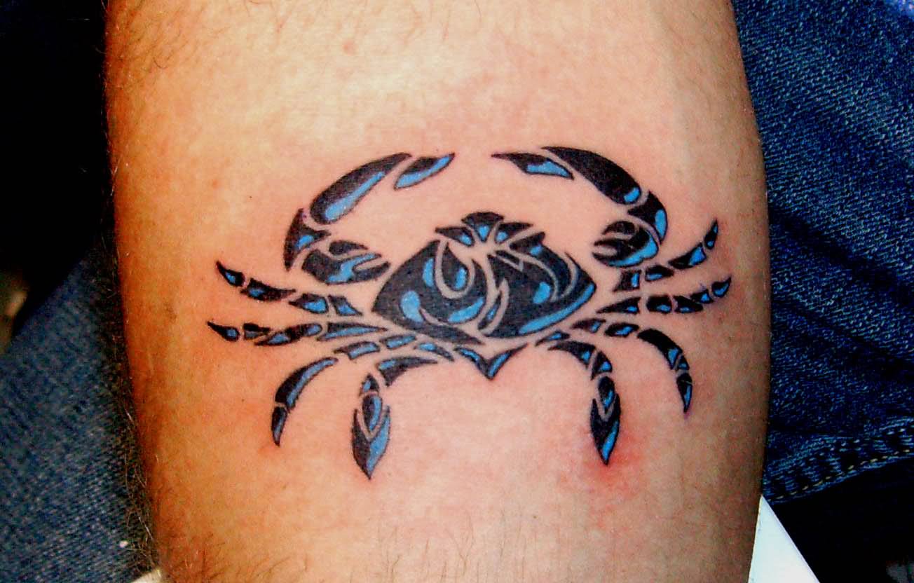 Black And Blue Cancer Tattoo On Arm
