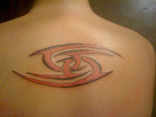 Black And Red Tribal Cancer Zodiac Tattoo On Upper Back