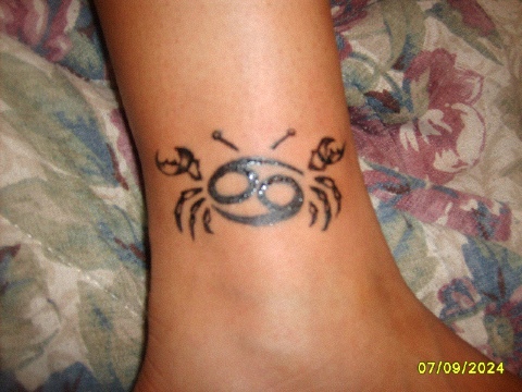 Black Ink Cancer Crab Tattoo On Leg
