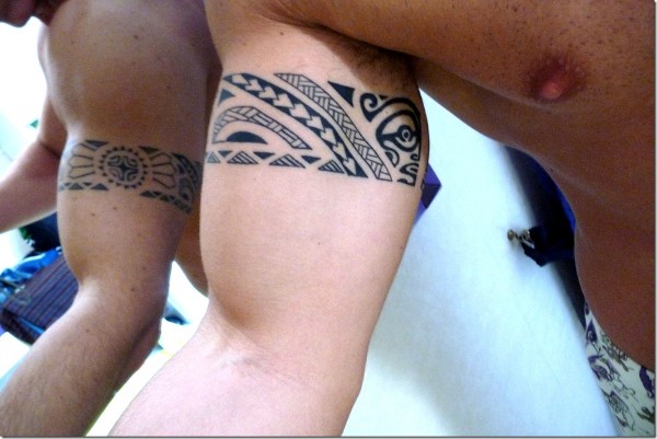 Black Polynesian Armband Tattoo On Man Bicep