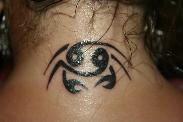 Black Tribal Cancer Zodiac Tattoo On Nape For Girls