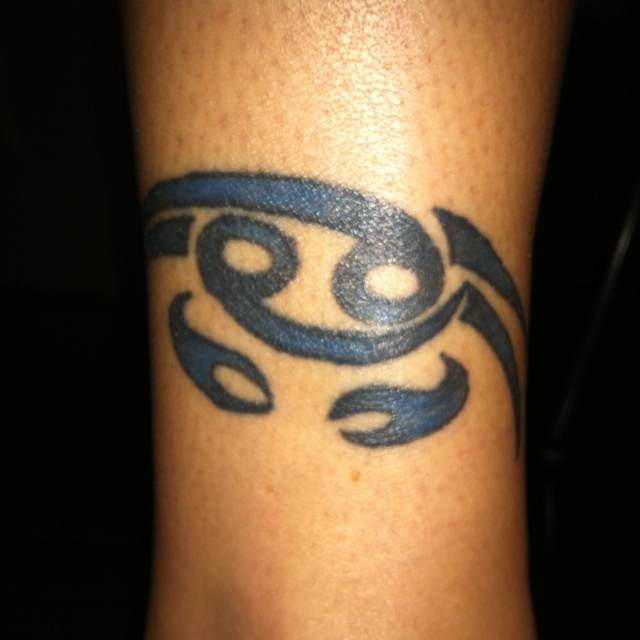 Blue Tribal Cancer Crab Tattoo On Leg