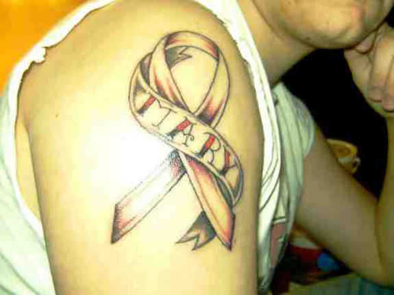 Cancer Ribbon With Mary Banner Tattoo On Right Shoulder