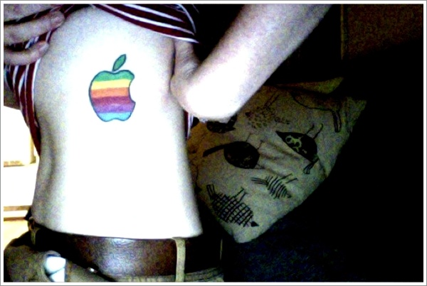 Colorful Apple Logo Tattoo On Side Rib