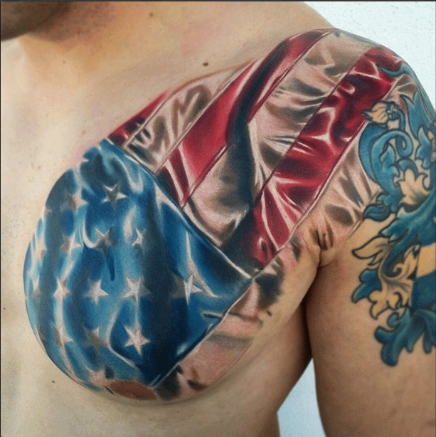 Cool American Flag Tattoo On Man Left Front Shoulder
