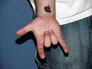 Cool Silhouette Apple Logo Tattoo On Wrist