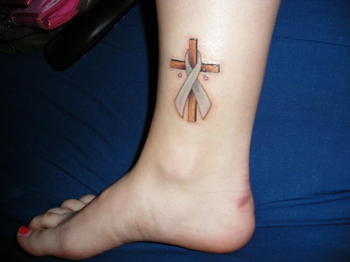 Cross And Lung Cancer Ribbon Sign Tattoo On Leg