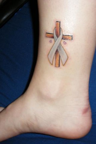 Cross And Lung Cancer Tattoo On Leg