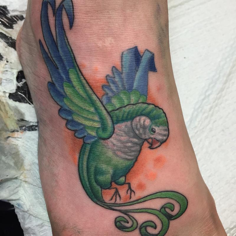 Cute Flying Parrot Tattoo Design