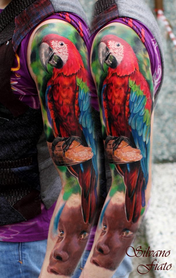 Fantastic Colorful Parrot Tattoo On Left Full Sleeve