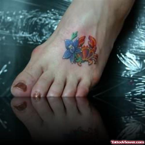 Flower And Cancer Crab Tattoo On Girl Foot