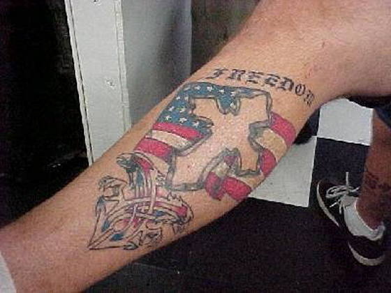Freedom - American Flag With Cross Tattoo On Leg
