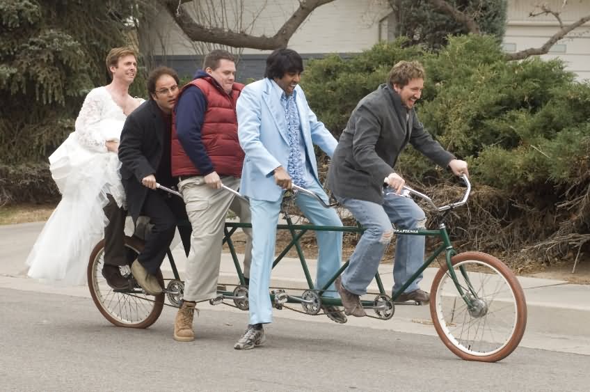 Funny Men Riding Long Cycle