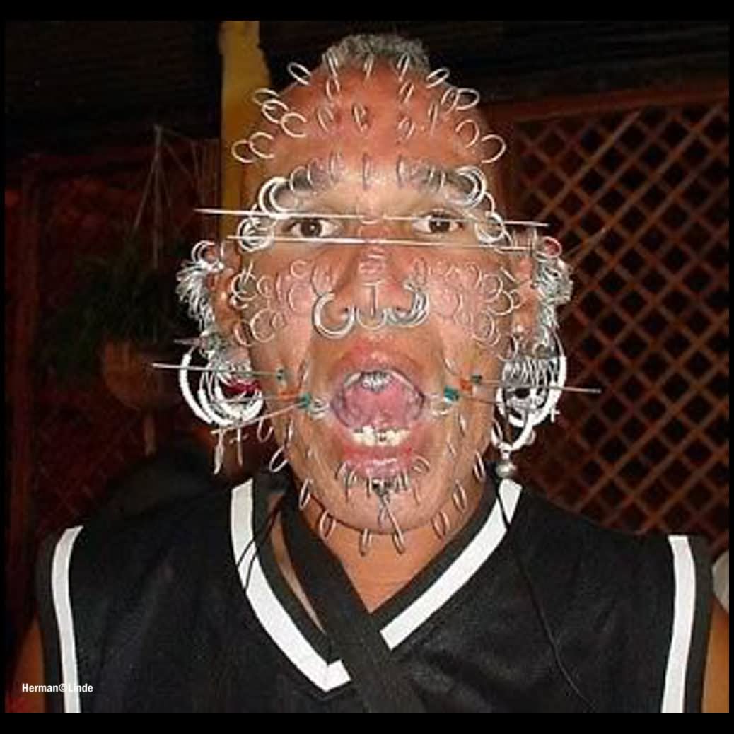 Funny Piercing Face Man Image