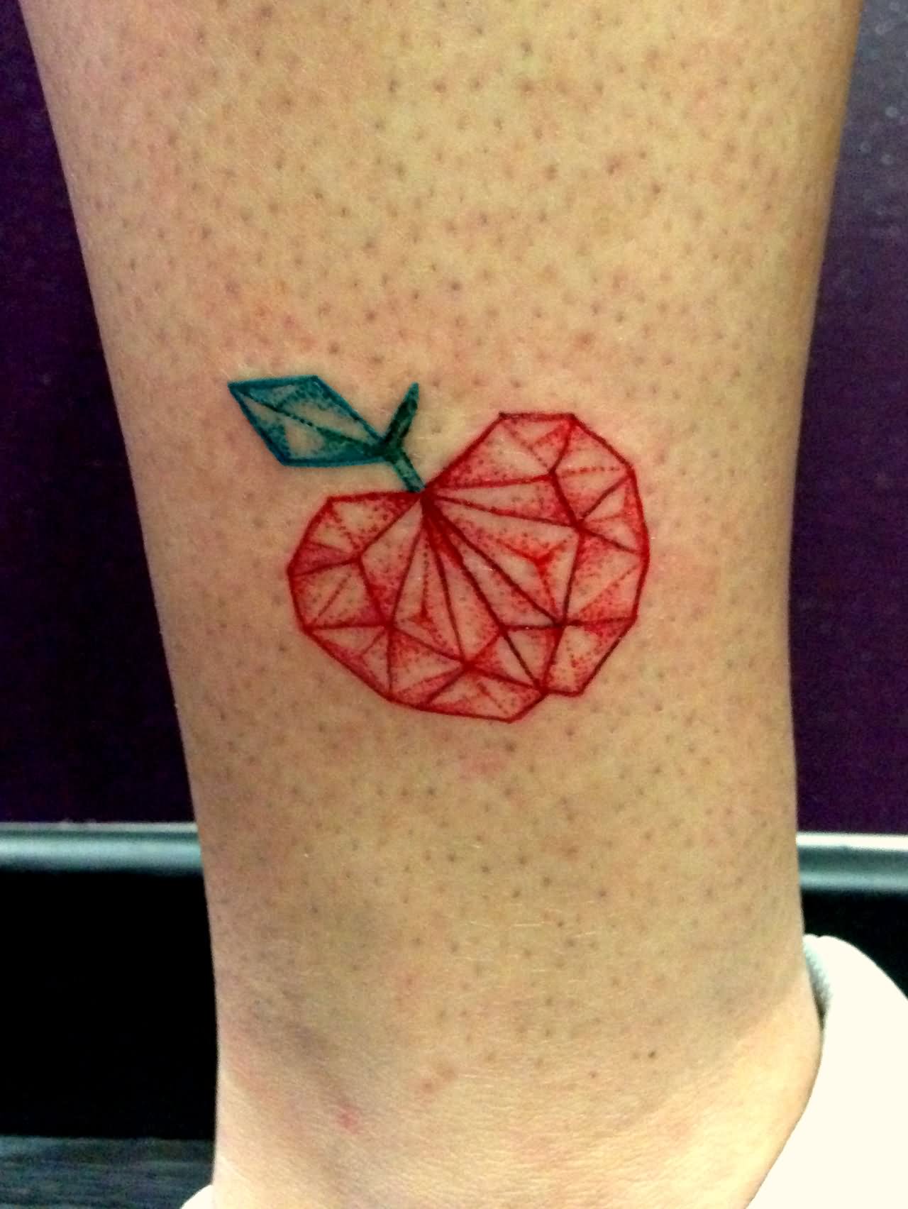 Geometric Red Apple Tattoo On Leg