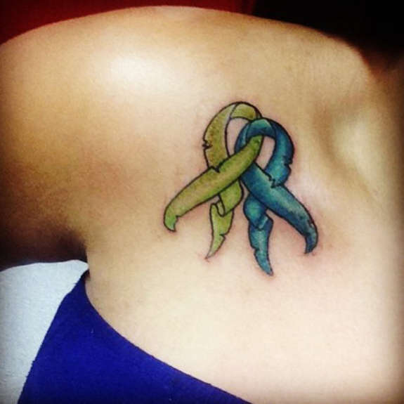 Green And Blue Breast Cancer Ribbon Tattoos On Shoulder