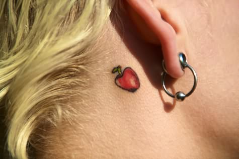 Little Red Apple Tattoo On Behind The Ear